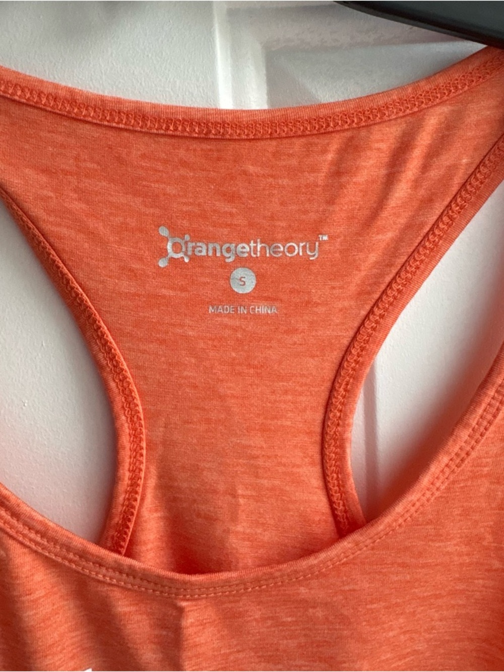 Orangetheory Orange Racerback Tank with White 'SPLATS' Graphic - Picture 2 of 2
